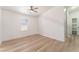 This cozy bedroom features wood-look floors, a ceiling fan, and closet storage space at , Las Vegas, NV 89156