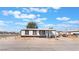 Cozy single-story home featuring a charming front porch and fenced yard, perfect for comfortable living at , Las Vegas, NV 89156