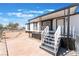 Charming front porch with white railings and stylish accents, offering a welcoming entrance to the home at , Las Vegas, NV 89156