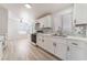 Modern kitchen with white cabinets, stainless steel appliances, and plenty of counter space at , Las Vegas, NV 89156