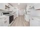 Bright kitchen with white cabinets, stylish hardware, and stainless steel oven at , Las Vegas, NV 89156