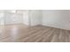 Bright living room features wood-look floors, fresh paint, and a ceiling fan for comfortable living at , Las Vegas, NV 89156