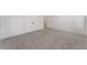 Spacious main bedroom with plush carpet and access to the ensuite bathroom and walk-in closet at , Las Vegas, NV 89156