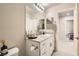 Stylish bathroom featuring granite counters, white cabinets, and modern fixtures at 4454 Lantern Point Ave, North Las Vegas, NV 89084