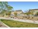 Beautiful community featuring manicured landscaping, walking paths, and lush green spaces at 4454 Lantern Point Ave, North Las Vegas, NV 89084