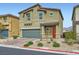 Charming two-story home featuring a two-car garage and drought-tolerant landscaping in a desirable neighborhood at 4454 Lantern Point Ave, North Las Vegas, NV 89084