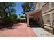 Spacious backyard with patio, landscaping, and private outdoor seating area at 10417 Niagara Falls Ln, Las Vegas, NV 89144