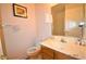 Clean bathroom with a vanity, toilet, and shower with glass doors, providing a functional space at 10417 Niagara Falls Ln, Las Vegas, NV 89144