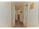 Bright hallway features hardwood floors and neutral colored walls, offering a clean, modern aesthetic at 10417 Niagara Falls Ln, Las Vegas, NV 89144