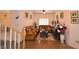 Cozy living room featuring comfortable seating, hardwood floors, and natural light, ideal for Gathering gatherings at 10417 Niagara Falls Ln, Las Vegas, NV 89144