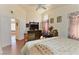 Spacious main bedroom featuring vaulted ceilings and wood floors at 10417 Niagara Falls Ln, Las Vegas, NV 89144