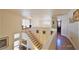 Bright view of upper level staircase and hallway of home at 10417 Niagara Falls Ln, Las Vegas, NV 89144