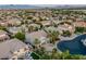 An aerial view of a beautiful home in a large community with other Gathering homes in the background at 11158 Antonine Wall Ct, Las Vegas, NV 89141