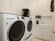 Convenient laundry room with modern washer and dryer at 11700 Belorado Ave, Las Vegas, NV 89138