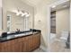 Bathroom features a double sink vanity, marble countertops, and modern fixtures at 1405 Vegas Valley Dr # 226, Las Vegas, NV 89169