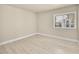 Bright, neutral bedroom featuring modern flooring and a window, providing lots of natural light at 1405 Vegas Valley Dr # 226, Las Vegas, NV 89169