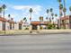 Exterior view of a building with well-maintained landscaping and community features, creating an inviting atmosphere at 1405 Vegas Valley Dr # 226, Las Vegas, NV 89169