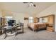 Large bedroom with great natural light, neutral carpet, and an attached office area at 1684 Flores Ln, Henderson, NV 89012