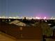 Stunning nighttime view of the lit-up Las Vegas city skyline at 1684 Flores Ln, Henderson, NV 89012
