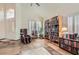 Inviting living area boasting tile floors, high ceilings, and abundant natural light at 1684 Flores Ln, Henderson, NV 89012