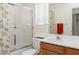 Bathroom showcasing a shower/tub combination, a white vanity, and modern fixtures at 1813 Villa Vista Way, Las Vegas, NV 89128