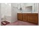 Bathroom featuring a double sink vanity, and a tub/shower combo at 1813 Villa Vista Way, Las Vegas, NV 89128