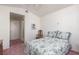 Bedroom boasts natural light, carpeted floors, and fresh neutral paint at 1813 Villa Vista Way, Las Vegas, NV 89128