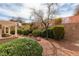 Backyard view featuring drought-resistant landscaping, gravel, and a covered patio at 2175 Point Mallard Dr, Henderson, NV 89012