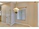 Dining area with hanging pendant light, tile floors, and views to the exterior at 2175 Point Mallard Dr, Henderson, NV 89012