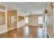 Spacious living room with wood flooring, open to the kitchen, and plenty of natural light at 2175 Point Mallard Dr, Henderson, NV 89012