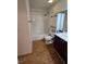 This bathroom features a shower-tub combo and coordinating vanity at 2232 Aspen Mirror Way # 204, Laughlin, NV 89029