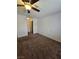 Bedroom featuring carpet, ceiling fan, and natural light with view of the closet and a joining room at 2232 Aspen Mirror Way # 204, Laughlin, NV 89029
