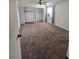 Bedroom featuring dual closets, carpet flooring, a ceiling fan, and a window for natural light at 2232 Aspen Mirror Way # 204, Laughlin, NV 89029