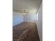 Comfortable bedroom featuring plush carpeting, a ceiling fan, natural light, and ample closet space at 2232 Aspen Mirror Way # 204, Laughlin, NV 89029
