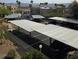 Community carport with covered parking, offering convenient and protected parking spaces at 2232 Aspen Mirror Way # 204, Laughlin, NV 89029