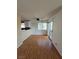 Dining area showcases a sliding glass door, laminate flooring, and access to the kitchen at 2232 Aspen Mirror Way # 204, Laughlin, NV 89029