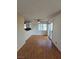 Dining area showcases a sliding glass door, laminate flooring, and access to the kitchen at 2232 Aspen Mirror Way # 204, Laughlin, NV 89029