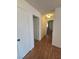Hallway with laminate flooring, closet and access to other rooms at 2232 Aspen Mirror Way # 204, Laughlin, NV 89029