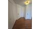 Hallway area with laminate flooring, closet and access to other rooms at 2232 Aspen Mirror Way # 204, Laughlin, NV 89029