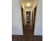 Carpeted hallway view featuring closet doors at 2232 Aspen Mirror Way # 204, Laughlin, NV 89029