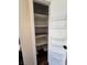 The pantry has multiple shelves and door racks, maximizing storage space at 2232 Aspen Mirror Way # 204, Laughlin, NV 89029