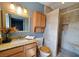 Bathroom featuring granite counters, wood cabinet, and a standup shower with tiled walls at 3105 Palo Verde Dr, Laughlin, NV 89029