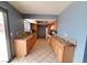 Bright kitchen featuring granite counters, stainless steel appliances, and tile flooring at 3105 Palo Verde Dr, Laughlin, NV 89029