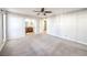 Bedroom area with a ceiling fan, wall-to-wall carpet, and access to a bathroom and closet at 3411 Sunfish Dr # B, Henderson, NV 89014
