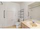 Bathroom with single sink vanity, toilet, and shower-tub combination at 3426 Dry Gulch Dr, Laughlin, NV 89029