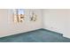 Light-filled bedroom with carpet flooring, and large windows at 3426 Dry Gulch Dr, Laughlin, NV 89029