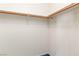 Empty closet with a wooden clothing rod at 3426 Dry Gulch Dr, Laughlin, NV 89029