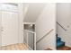 Inviting entryway featuring a white front door, tile flooring, and stairway access at 3426 Dry Gulch Dr, Laughlin, NV 89029