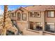 Townhome exterior with landscaped front yard and desert style yard at 3426 Dry Gulch Dr, Laughlin, NV 89029