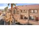 Townhome exterior with landscaped front yard and desert style yard at 3426 Dry Gulch Dr, Laughlin, NV 89029